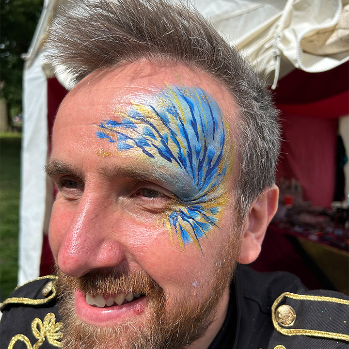 Edgy face paint at the Green Man festival